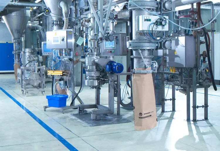 Produktrückgewinnung für ein System zur Verarbeitung von Pulver und Schüttgütern